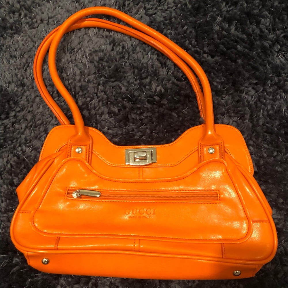 Orange Gucci bag